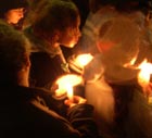 Students at a candlelight vigil for Sudan, 12/2004